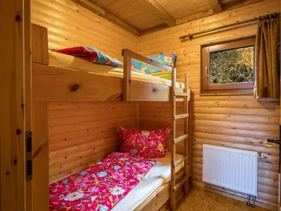 Ein Bett oder Betten in einem Zimmer der Unterkunft Apartment Reinskopf-2 by Interhome