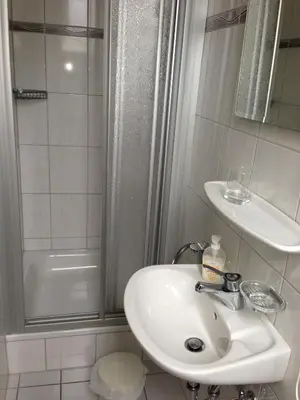 Ein Badezimmer in der Unterkunft Hotel Schatulle