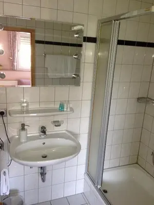 Ein Badezimmer in der Unterkunft Hotel Schatulle