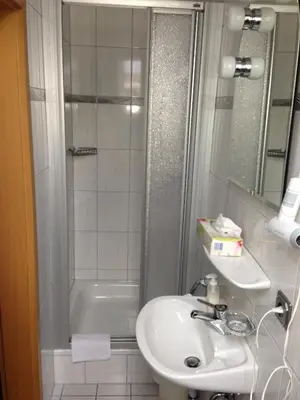Ein Badezimmer in der Unterkunft Hotel Schatulle
