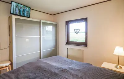 Ein Bett oder Betten in einem Zimmer der Unterkunft Ferienhaus 21 In Thalfang