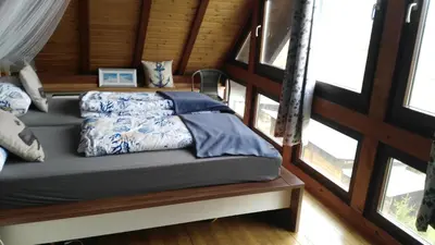 Ein Bett oder Betten in einem Zimmer der Unterkunft Exklusive Ferienwohnung Lurelei 150 qm mit Traumblick 4 bis 9 P