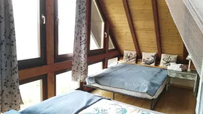 Ein Bett oder Betten in einem Zimmer der Unterkunft Exklusive Ferienwohnung Lurelei 150 qm mit Traumblick 4 bis 9 P