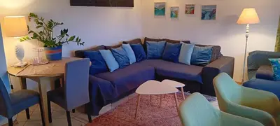 Ein Sitzbereich in der Unterkunft Exklusive Ferienwohnung Lurelei 150 qm mit Traumblick 4 bis 9 P