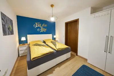 Ein Bett oder Betten in einem Zimmer der Unterkunft Ferienhaus Mosel-Herberge