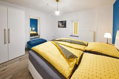Ein Bett oder Betten in einem Zimmer der Unterkunft Ferienhaus Mosel-Herberge