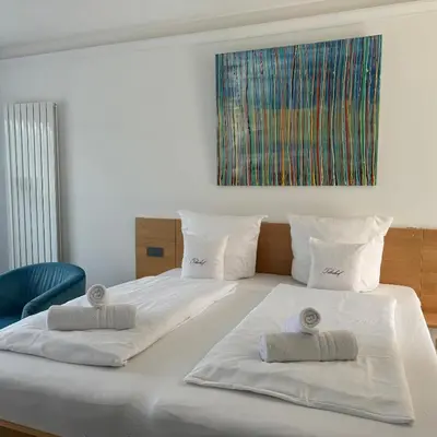 Ein Bett oder Betten in einem Zimmer der Unterkunft Weingut Tiliahof