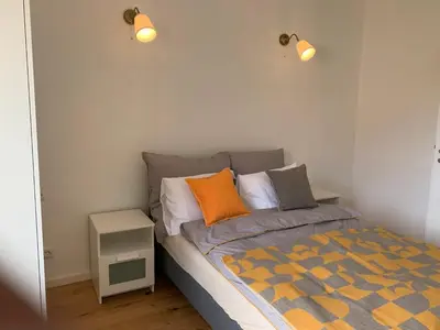 Ein Bett oder Betten in einem Zimmer der Unterkunft Home Feeling trierweiler