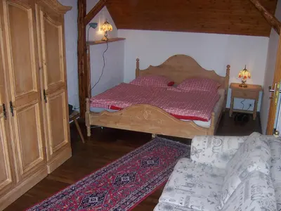 Ein Bett oder Betten in einem Zimmer der Unterkunft Ferienhaus Haus am Wald Nähe Loreley