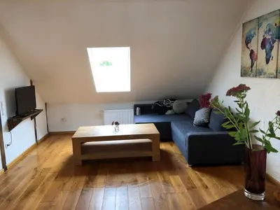 Ein Sitzbereich in der Unterkunft Ferienwohnung in historischem Bauernhaus in der Eifel