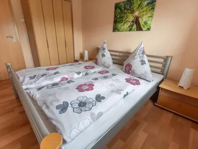 Ein Bett oder Betten in einem Zimmer der Unterkunft Ferienhof An der Lay