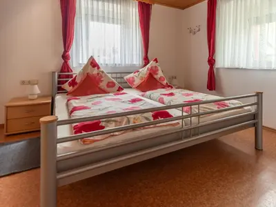 Ein Bett oder Betten in einem Zimmer der Unterkunft Ferienhof An der Lay