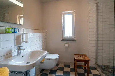 Ein Badezimmer in der Unterkunft Ehemaliges Schusterhaus mit Dachterrasse - Ferienhaus