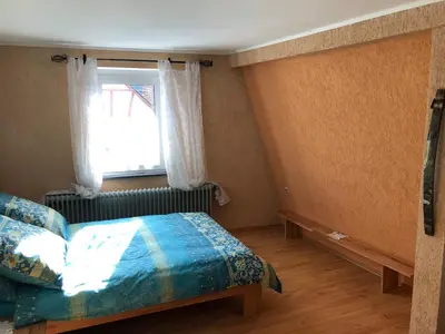 Ein Bett oder Betten in einem Zimmer der Unterkunft Paulusstrasse 3