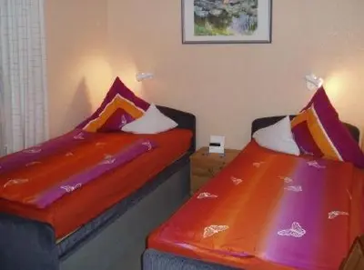 Ein Bett oder Betten in einem Zimmer der Unterkunft Ferienwohnung Salker