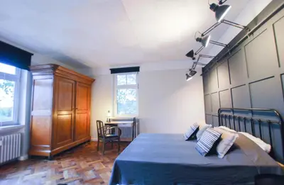 Ein Bett oder Betten in einem Zimmer der Unterkunft Alte Schule Gästehaus - The principal's rooms Appartment