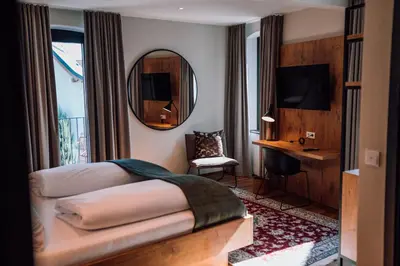 Ein Bett oder Betten in einem Zimmer der Unterkunft Schmidtburger Hof - Landhotel, Restaurant & Sauna