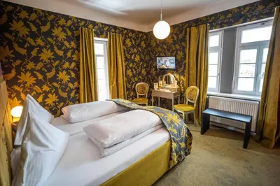 Ein Bett oder Betten in einem Zimmer der Unterkunft Domäne am See
