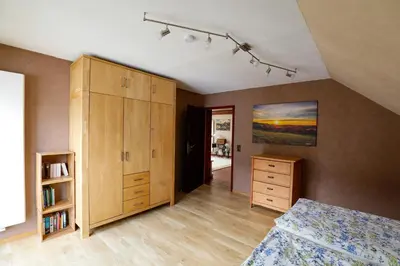 Ein Bett oder Betten in einem Zimmer der Unterkunft Silence Ferienwohnungen mit - 2 Apartments