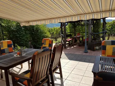 Ein Sitzbereich in der Unterkunft Ferienweinhaus Römer-Knodt