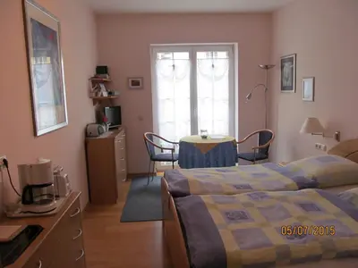 Ein Bett oder Betten in einem Zimmer der Unterkunft FeWo Ingrid Trossen