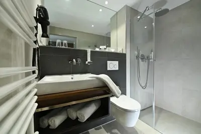Ein Badezimmer in der Unterkunft Parkhotel 