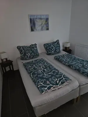 Ein Bett oder Betten in einem Zimmer der Unterkunft FeWo Louise