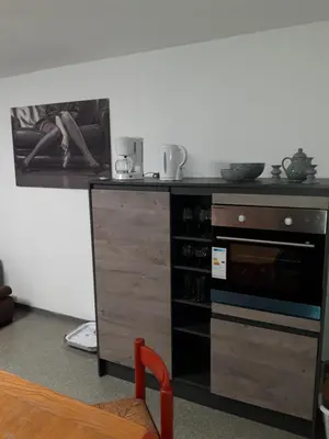 Küche/Küchenzeile in der Unterkunft St Maximin City Ferienwohnungen