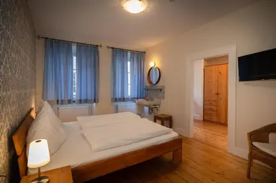 Ein Bett oder Betten in einem Zimmer der Unterkunft Weingut Josef Ehses