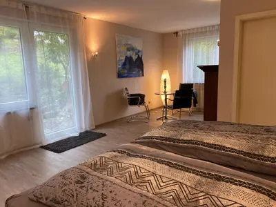 Ein Bett oder Betten in einem Zimmer der Unterkunft Am alten Apfelbaum - Fewo 2