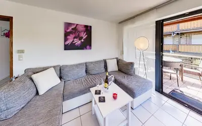 Ein Sitzbereich in der Unterkunft Ferienwohnung Seeblick