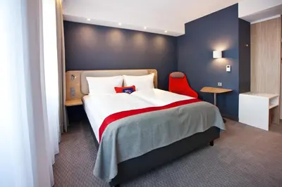Ein Bett oder Betten in einem Zimmer der Unterkunft Holiday Inn Express - Trier by IHG