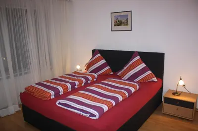 Ein Bett oder Betten in einem Zimmer der Unterkunft Ferienwohnung Ziemons