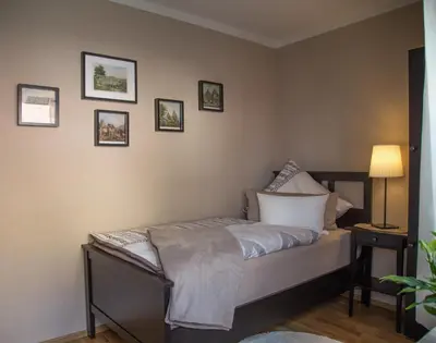 Ein Bett oder Betten in einem Zimmer der Unterkunft Feriendomizil Willi & Renate