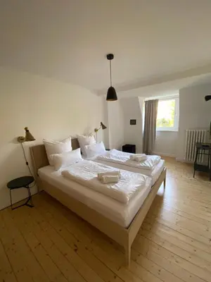 Ein Bett oder Betten in einem Zimmer der Unterkunft Fabelhaus