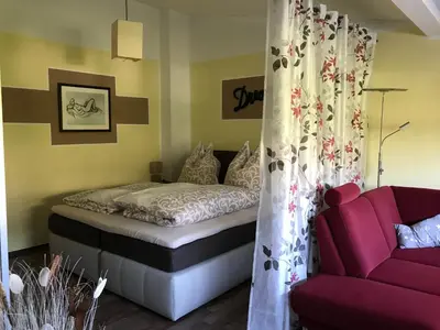 Ein Bett oder Betten in einem Zimmer der Unterkunft Moselnest