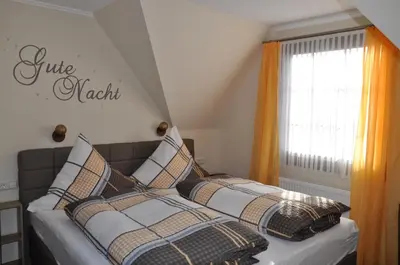 Ein Bett oder Betten in einem Zimmer der Unterkunft Winneburger Hof