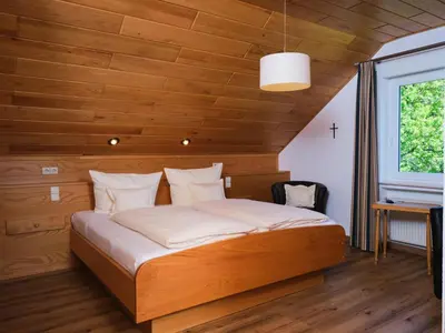 Ein Bett oder Betten in einem Zimmer der Unterkunft Ferienweingut-Liebfried