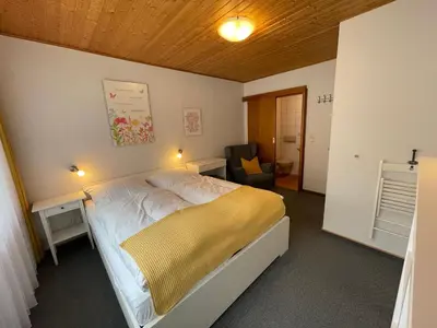 Ein Bett oder Betten in einem Zimmer der Unterkunft Ferienwohnungen Haus zur Linde