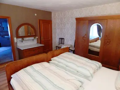 Ein Bett oder Betten in einem Zimmer der Unterkunft Ferienhaus Stahlberg