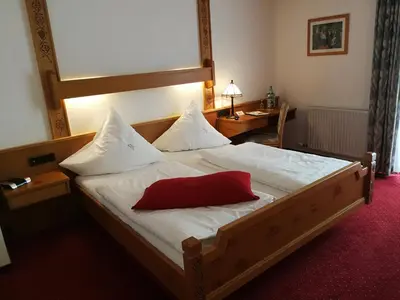 Ein Bett oder Betten in einem Zimmer der Unterkunft Winzerhof Brachtendorf