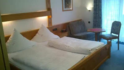 Ein Bett oder Betten in einem Zimmer der Unterkunft Winzerhof Brachtendorf