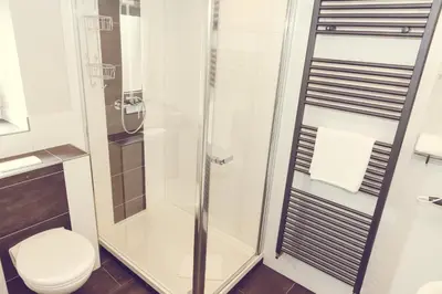 Ein Badezimmer in der Unterkunft Hotel Garni Reis