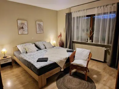Ein Bett oder Betten in einem Zimmer der Unterkunft Ferienwohnung Maria Laach