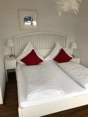 Ein Bett oder Betten in einem Zimmer der Unterkunft Ferienwohnung Stadtflair