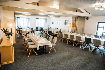 Ein Restaurant oder anderes Speiselokal in der Unterkunft Zur Kringelwies