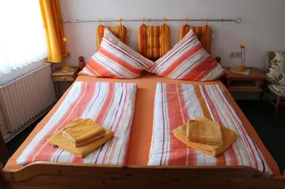 Ein Bett oder Betten in einem Zimmer der Unterkunft Pension Haus Thies