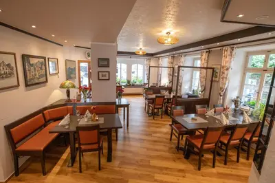 Ein Sitzbereich in der Unterkunft Hotel Gästehaus auf der Lay