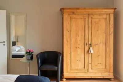 Ein Bett oder Betten in einem Zimmer der Unterkunft Weingut & Gästehaus Christoph Clüsserath