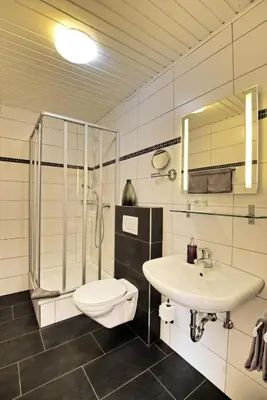 Ein Badezimmer in der Unterkunft Weingut & Gästehaus Christoph Clüsserath
